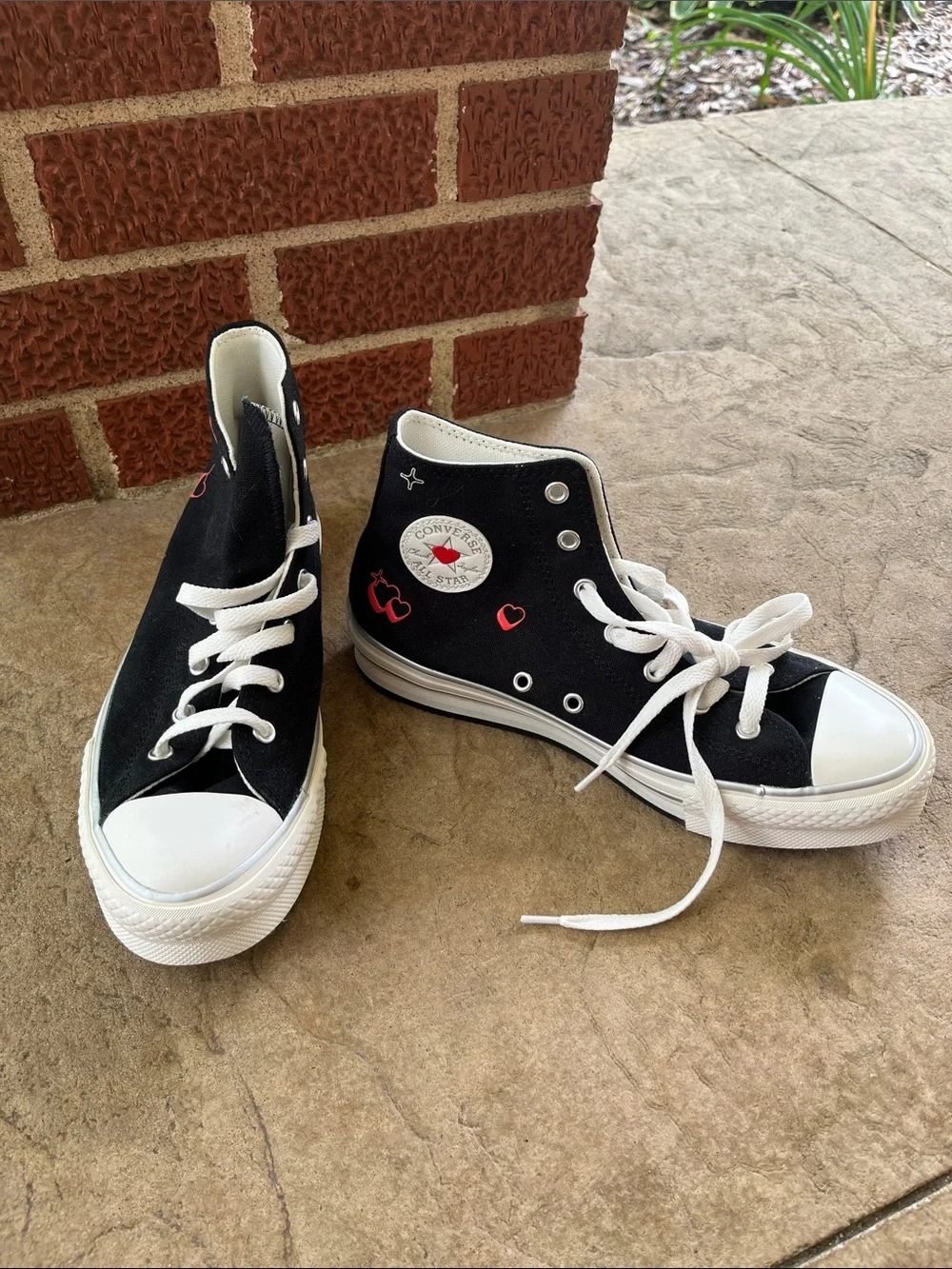 Converse Kids Black High-Top Sneakers with White Soles and Red Heart Details